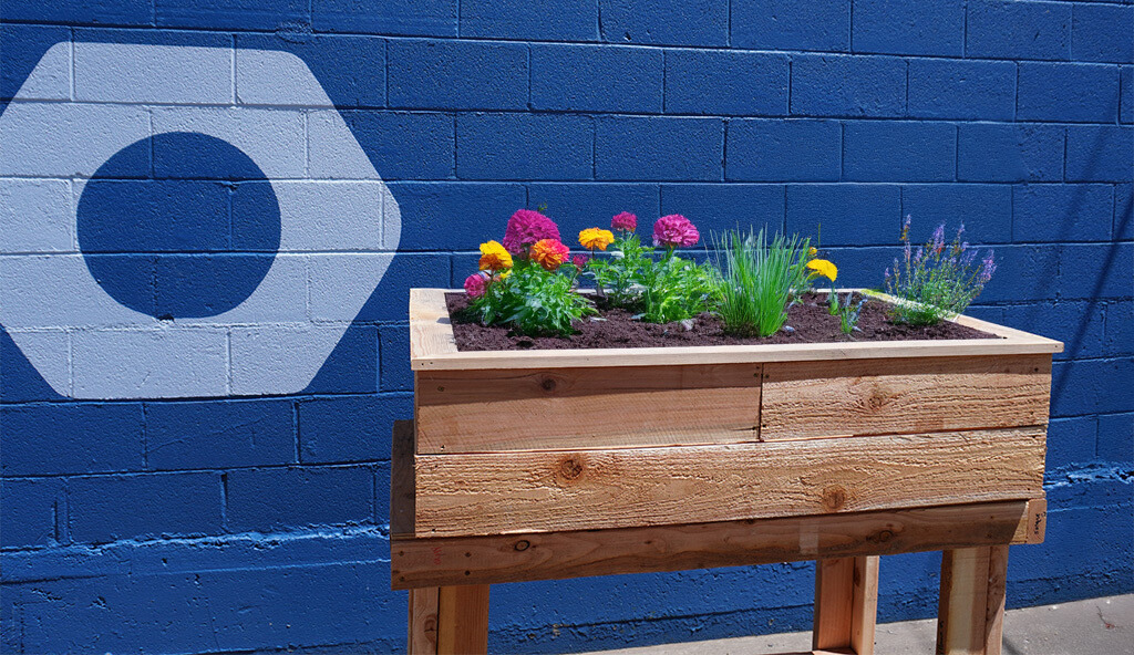 DIY planter box with flowers from Bend-Redmond Habitat for Humanity Work Bench Series class